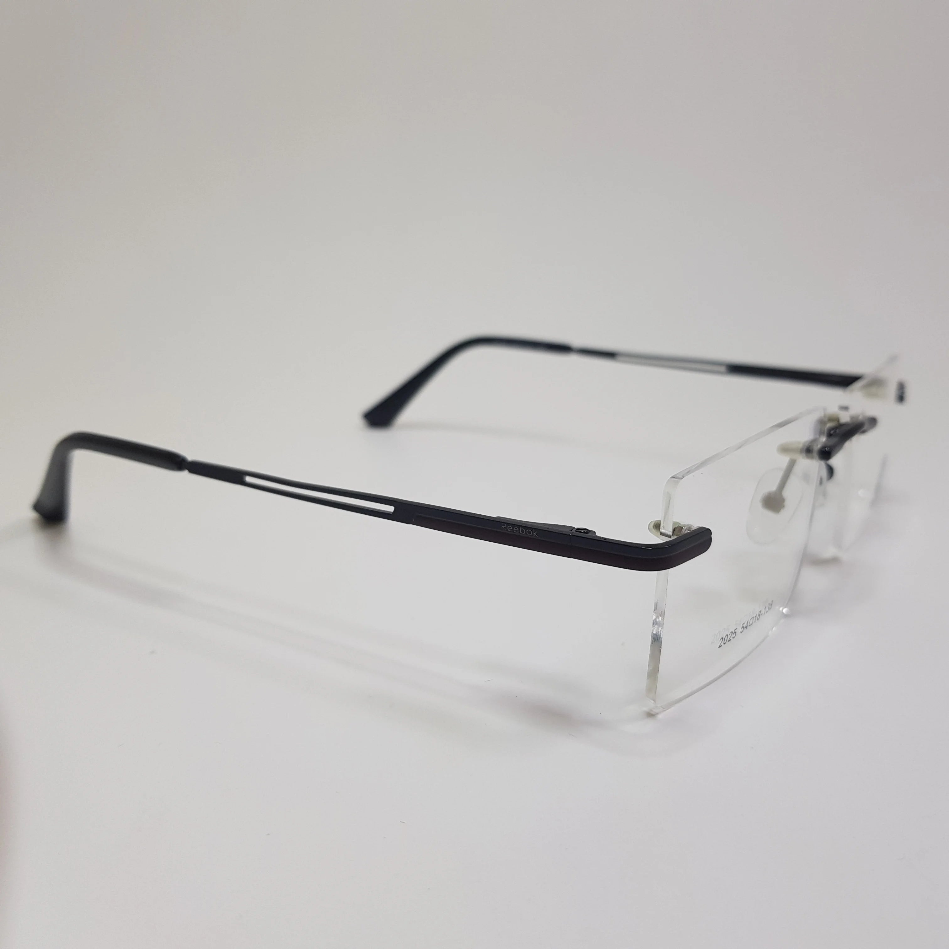 2025 Reebok Eyeglasses Rimless Frame Premium Quality Unisex