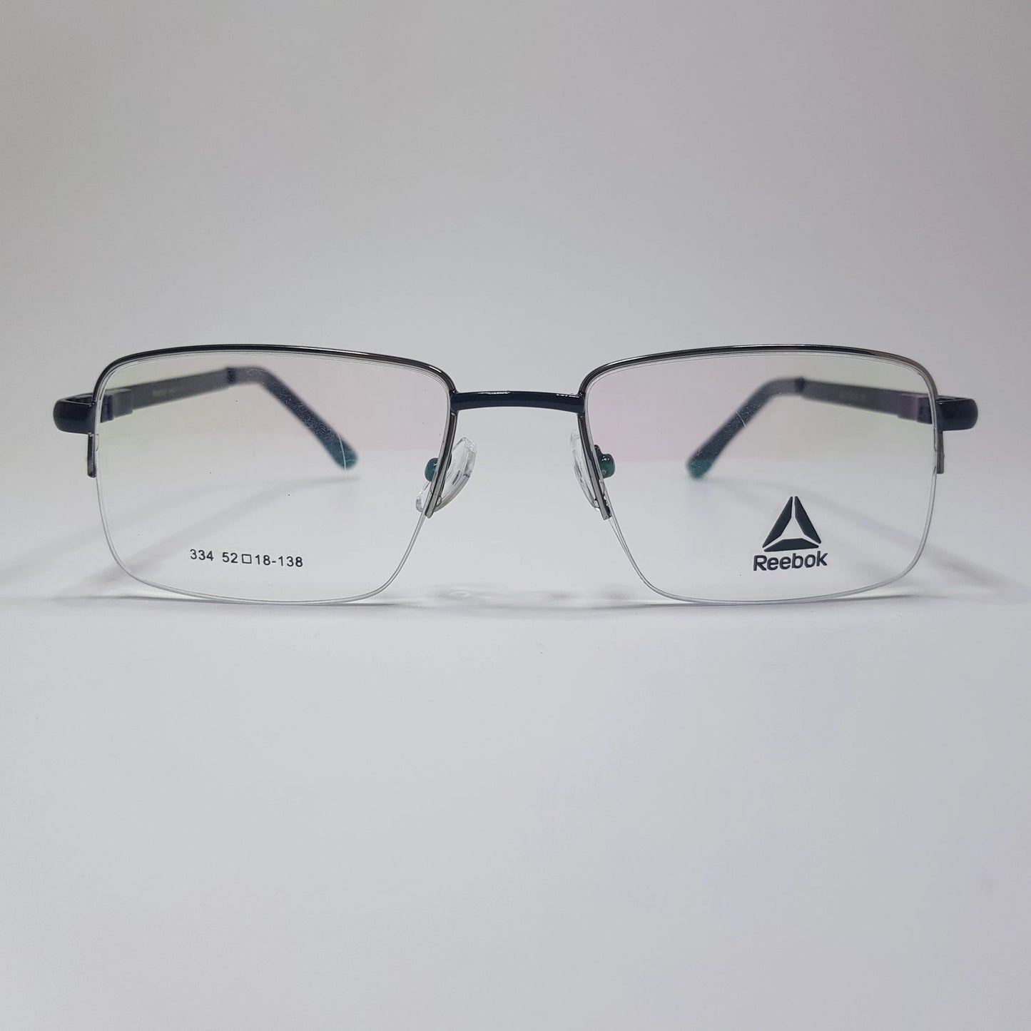334 Reebok Eyeglasses Half Rimless Frame Premium Quality Spring Hinges Unisex