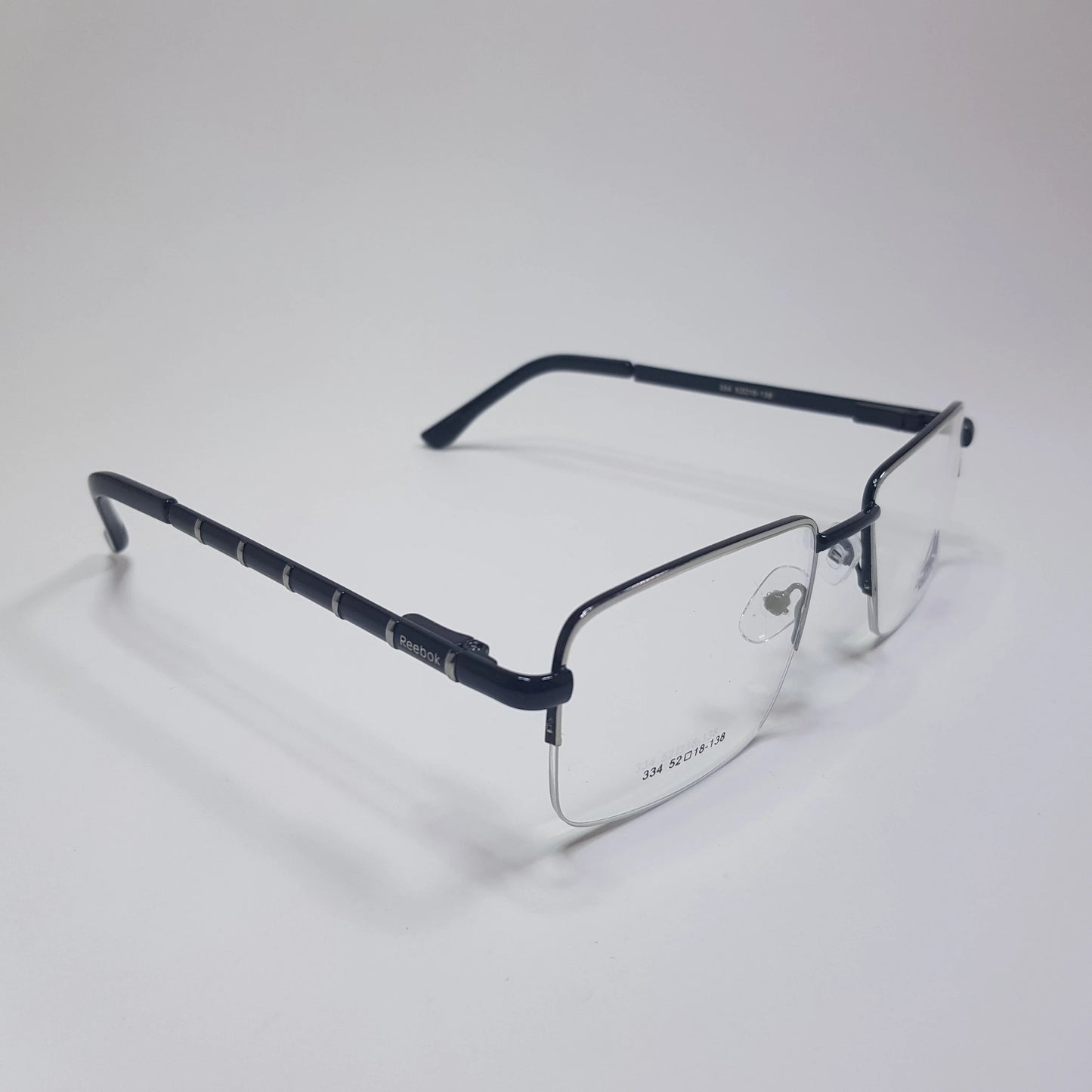 334 Reebok Eyeglasses Half Rimless Frame Premium Quality Spring Hinges Unisex